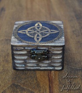 small wooden box engraved with the protective witch's knot
