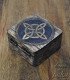 rear view of wooden box engraved on the lid with the symbol of the witch's knot