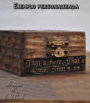 Front of wooden box engraved with personalized text under the closure.