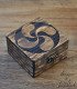 small wooden jewelry box engraved with the Basque symbol of the Lauburu
