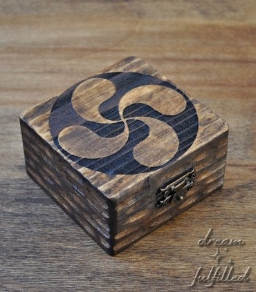 small wooden jewelry box engraved with the Basque symbol of the Lauburu