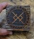 view of wooden box lid engraved with Viking rune