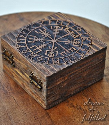 Rear side view of wooden box engraved with Viking symbol