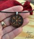 Detail of the engraving on the wooden pendant