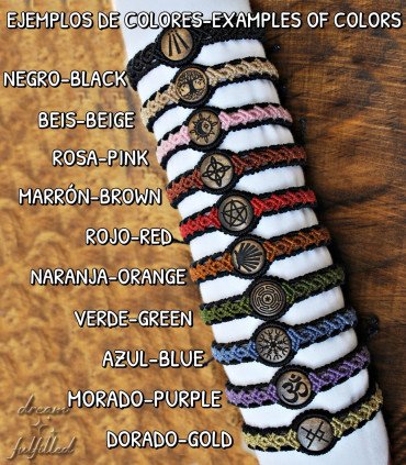 several bracelets of different colors with different symbols engraved in wood