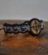 Witch’s Knot bracelet with hematite beads on wood