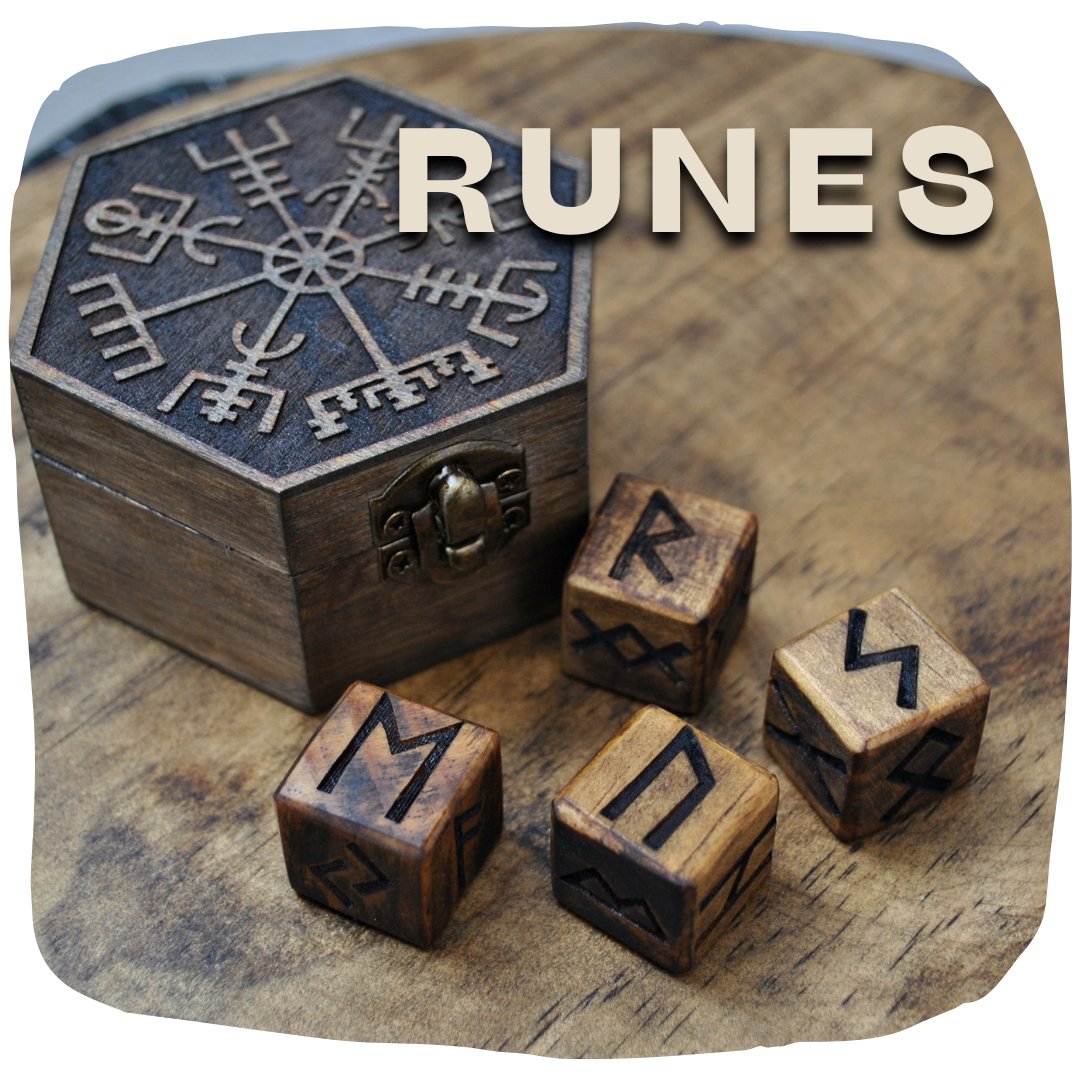 Wooden box containing four dice engraved with Viking runes